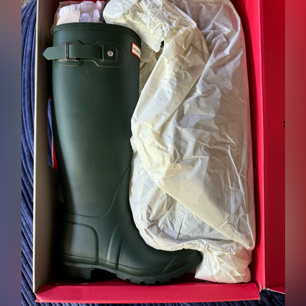 Brand new, in box.  Tall, green, hunter boots. Women’s, Size 5.